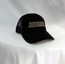 Load image into Gallery viewer, All black Trucker Cap with Gold Logo