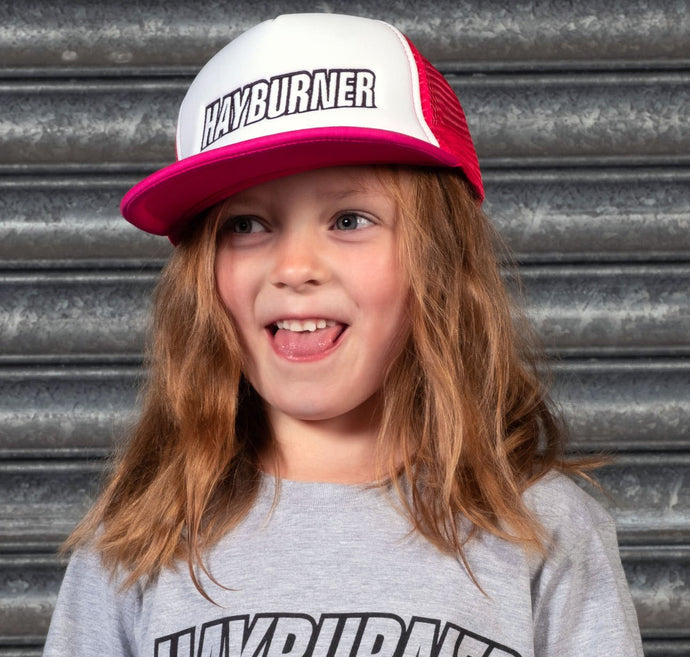 Kid's Pink/White Trucker Cap with embroidered black logo.