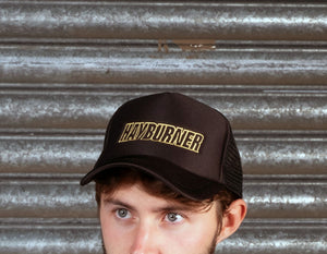 All black Trucker Cap with Gold Logo